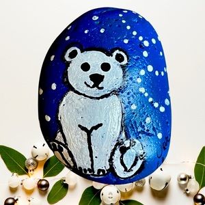 Hand crafted painted Christmas Polar Bear rock blue background white snow hearts